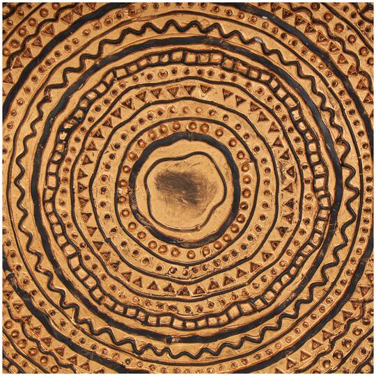 17" Brown Metal Tribal Carved Circular Sculpture with Black Stand & Wavy Edge